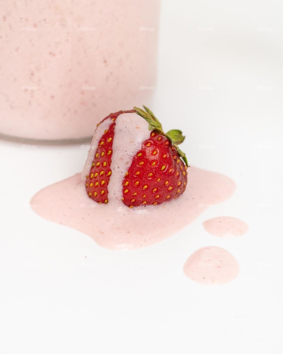 Macro of strawberry with liquid 