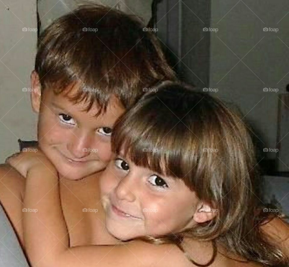 Portrait of happy brother and sister