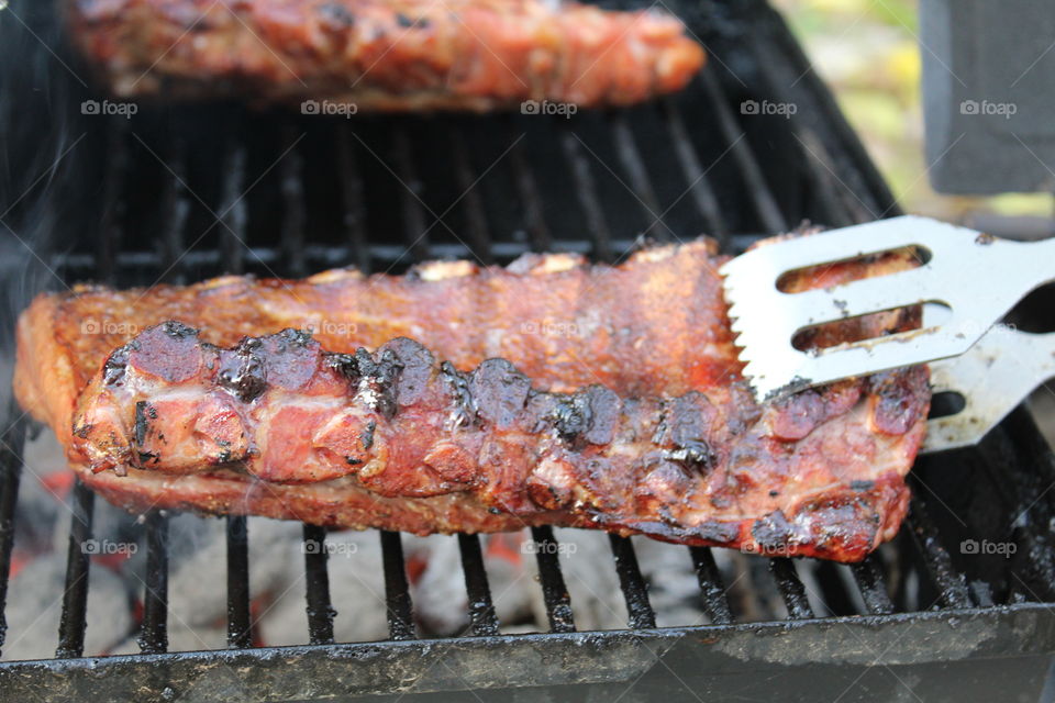 Meat on barbecue grill