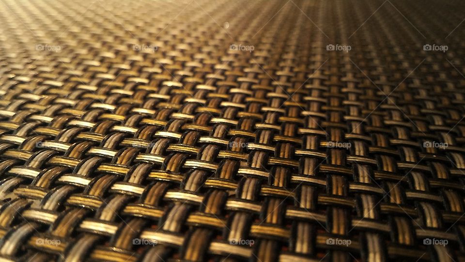 Textured surface of a mat