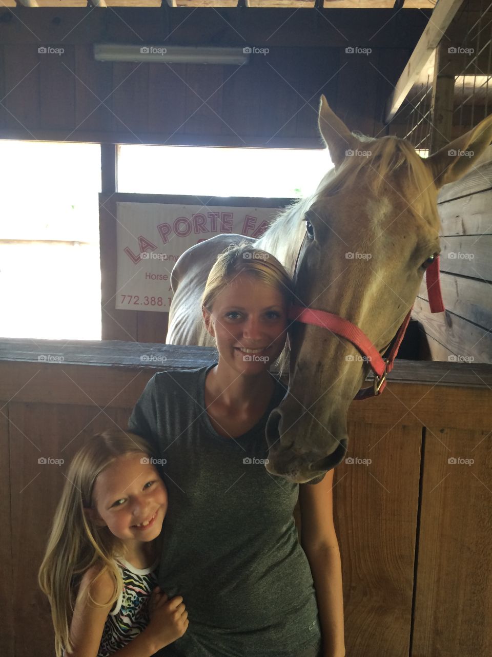 Mother daughter and a horse