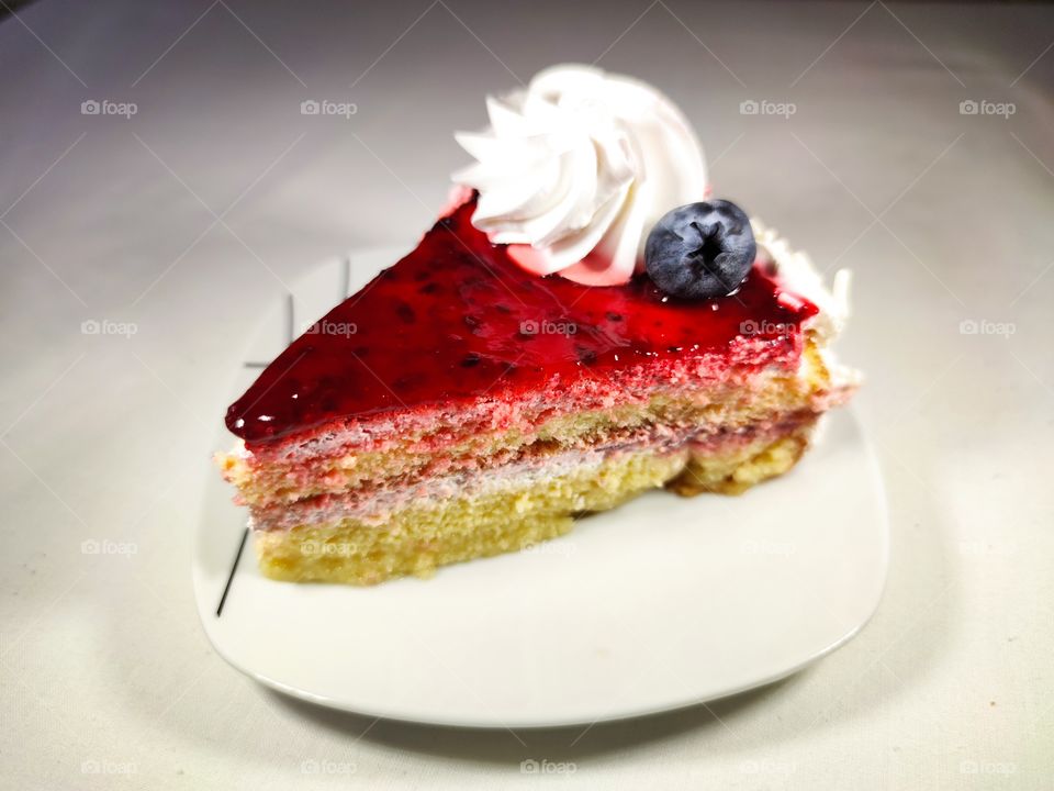 Strawberry cake with whipped cream