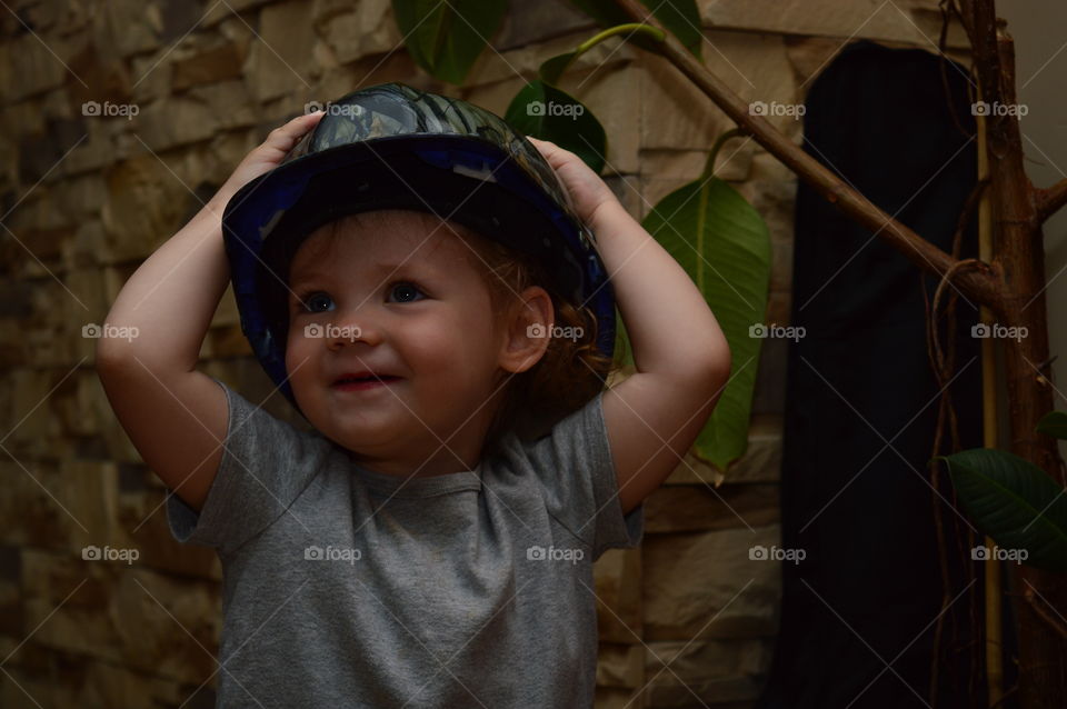 Happy kid with unique helmet