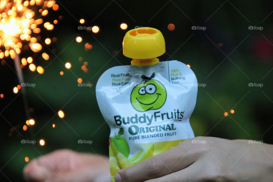 Buddy fruits with sparkler background 