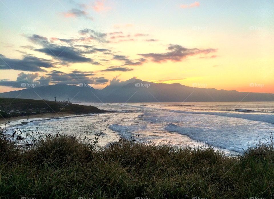 Coastal hills at sunset