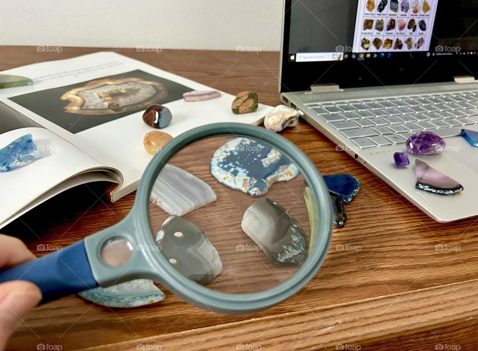 Studying colorful rocks on a desk