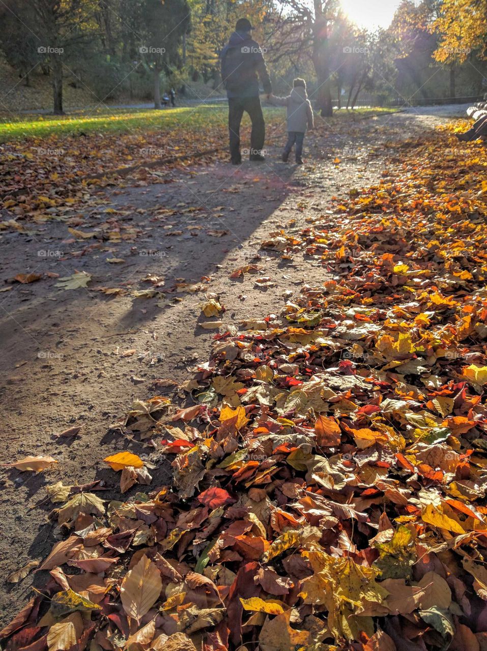 father and son walking