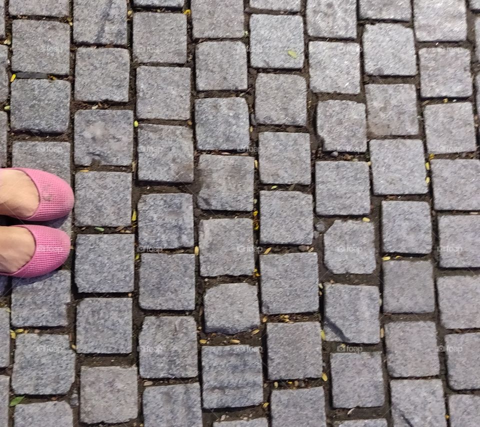 square shape bricks on the ground