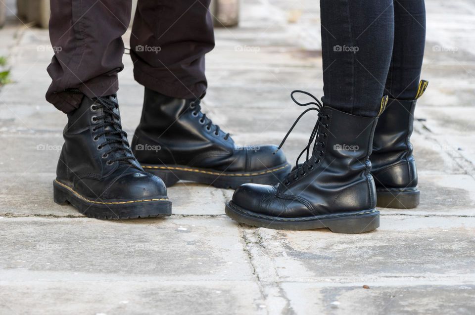 The couple put on Dr. Martens black boots