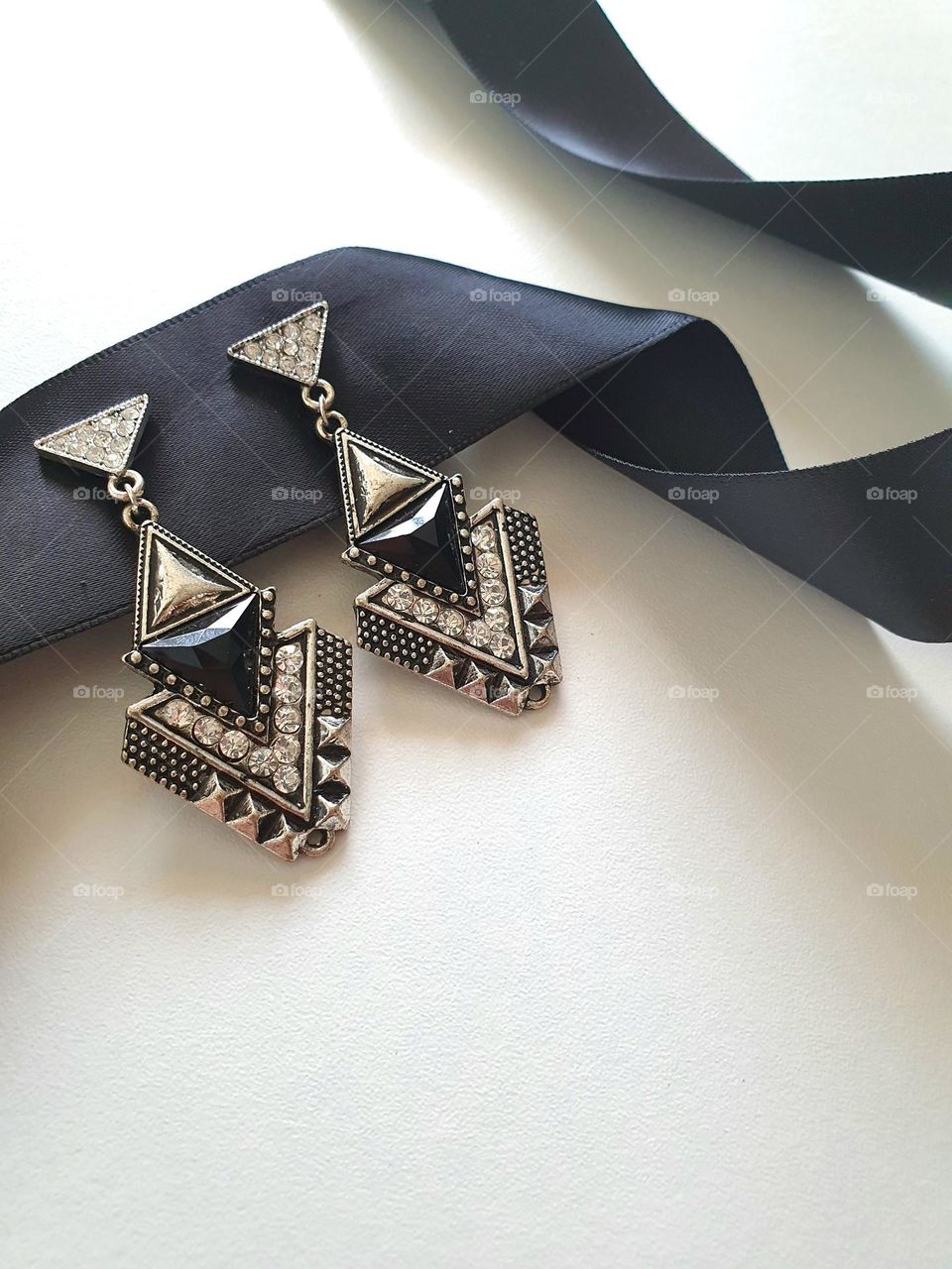 triangle  - black-silver earrings with rhinestones of small triangels lie on black silk ribbon