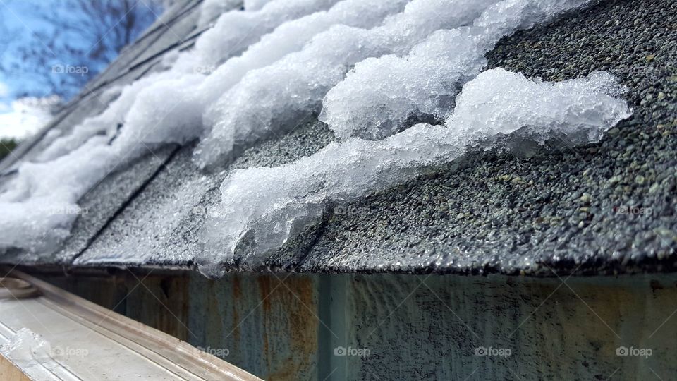 snow melting off my old tool shed