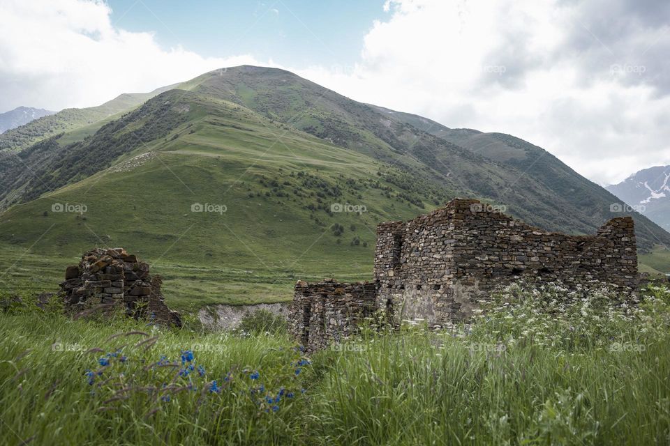 Ancient ruined  tower in high mountains