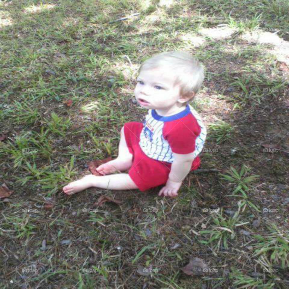 My son sitting outside