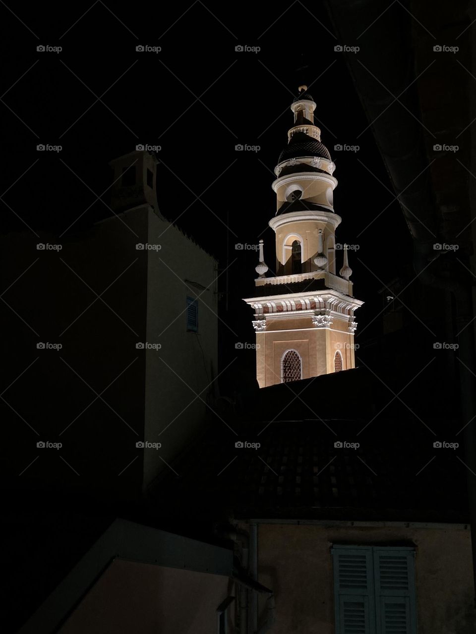 The baroque style steeple of the Basilica of Saint Michael Archangel Basilique Saint-Michel Archange de Menton, France.