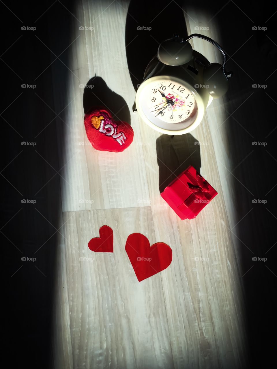 Red color story. Clocks and love hearts