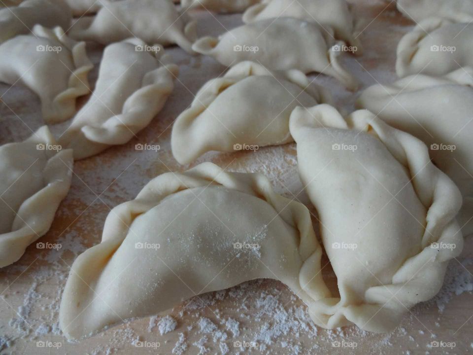 Polish dumplings 'pierogi' with cottage cheese and boiled potatoes very popular in Poland