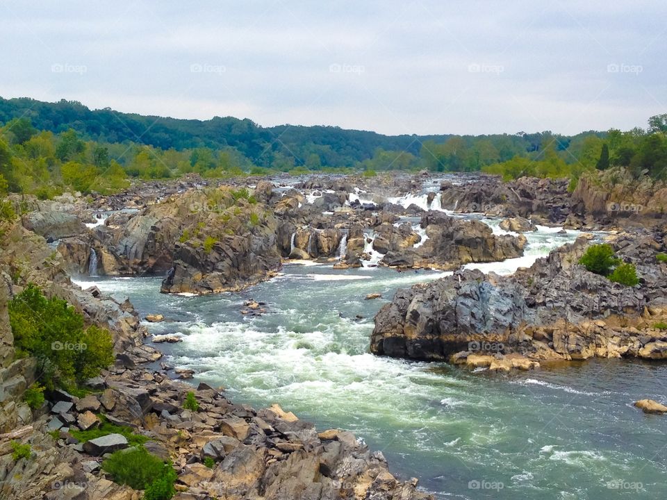 Rapid river flowing through rocks