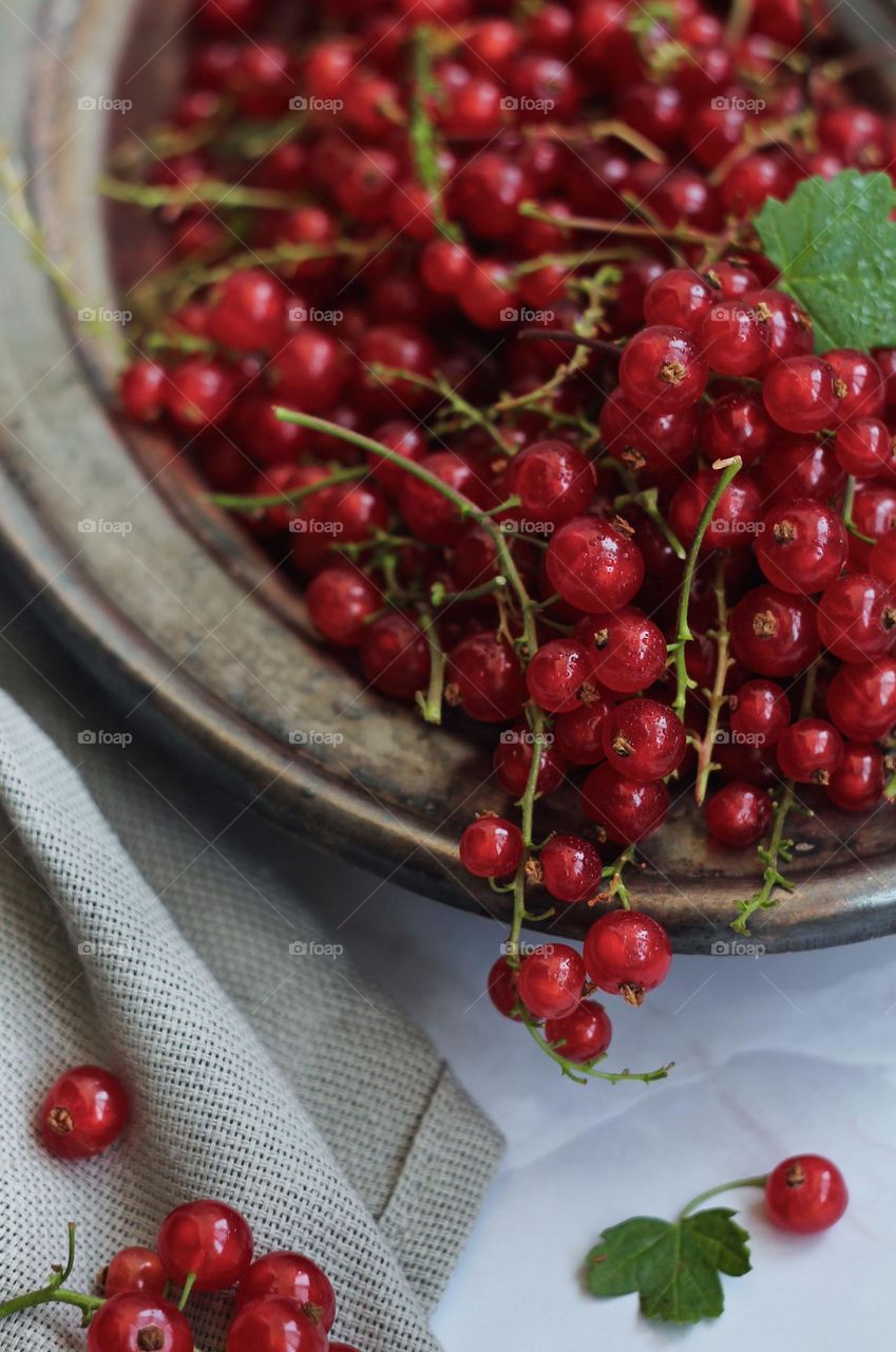 Red currant on a plate