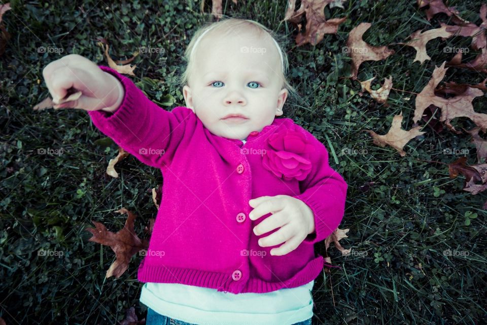 Playing with leaves. Watching the leaves fall and grabbing them was mesmerizing and relaxing