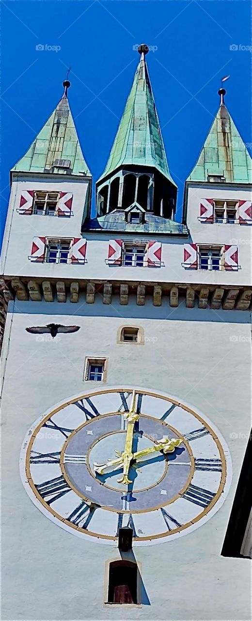 This is the medieval clock tower, the “Stadtturm” in “Straubing”, “Niederbayern” or “Lower Bavaria” located between two squares, “Ludwigsplatz” and “Theresienplatz” named after the Bavarian royal couple who visited in 1812. 2024. Hypnotic Productions