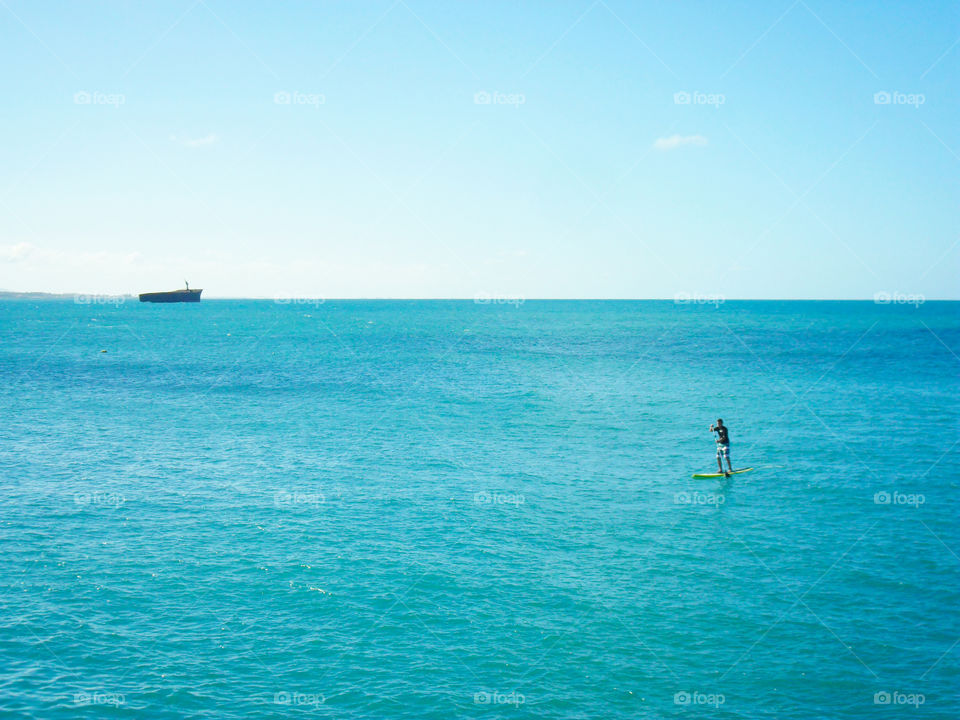 Stand up paddle on the beach