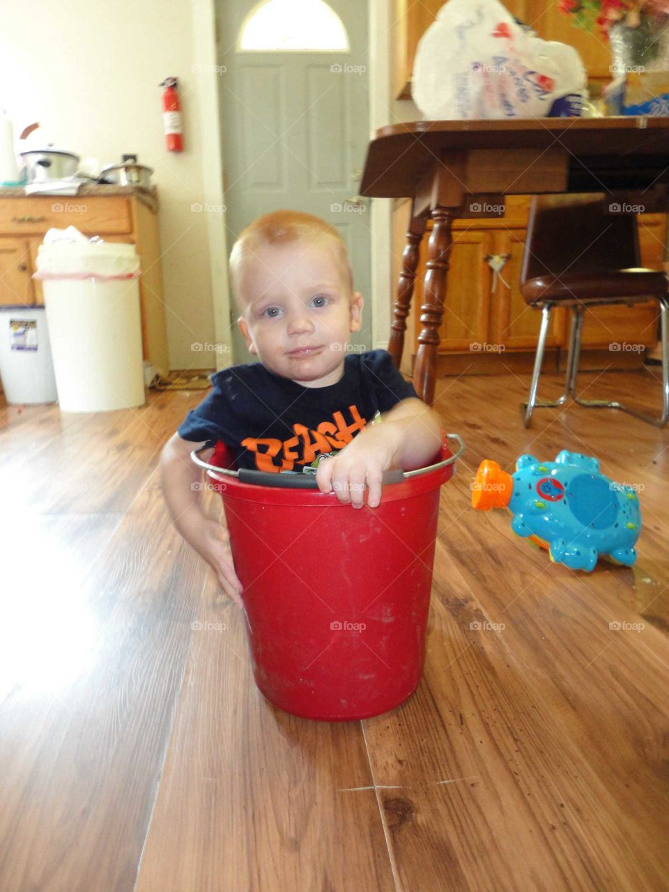 boy in bucket