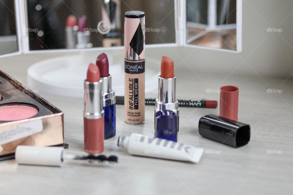 Beauty products in front of the mirror