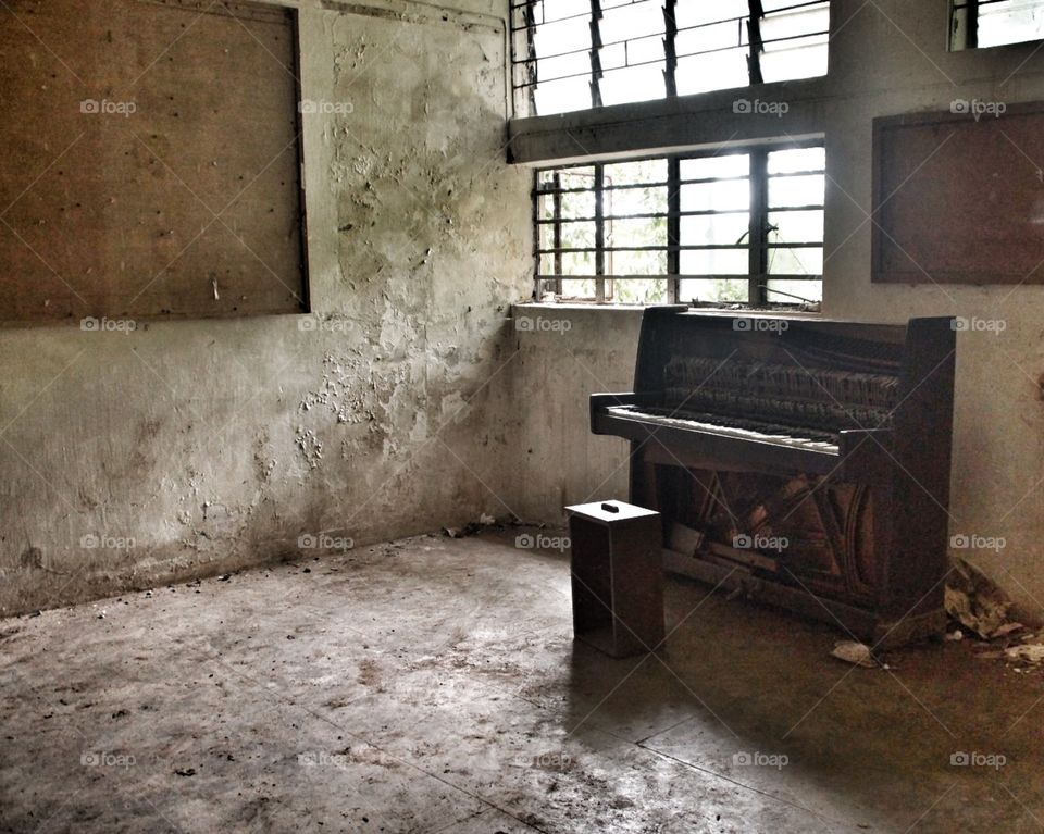 Broken piano room