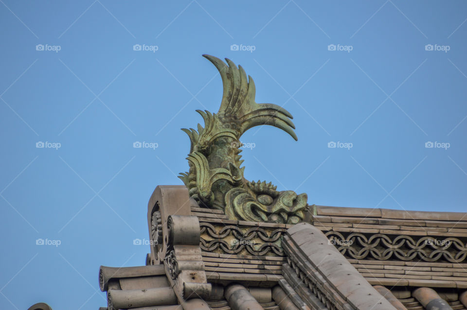 Fish Statue On A Castle