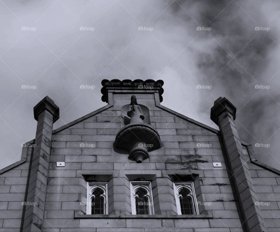 black and white low angle shot of a historical church building in Downtown Sacramento