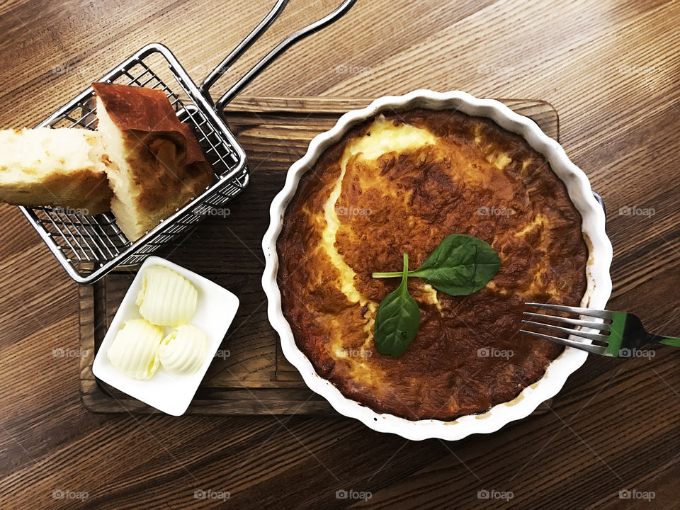 Omelette with toasts and butter for breakfast 