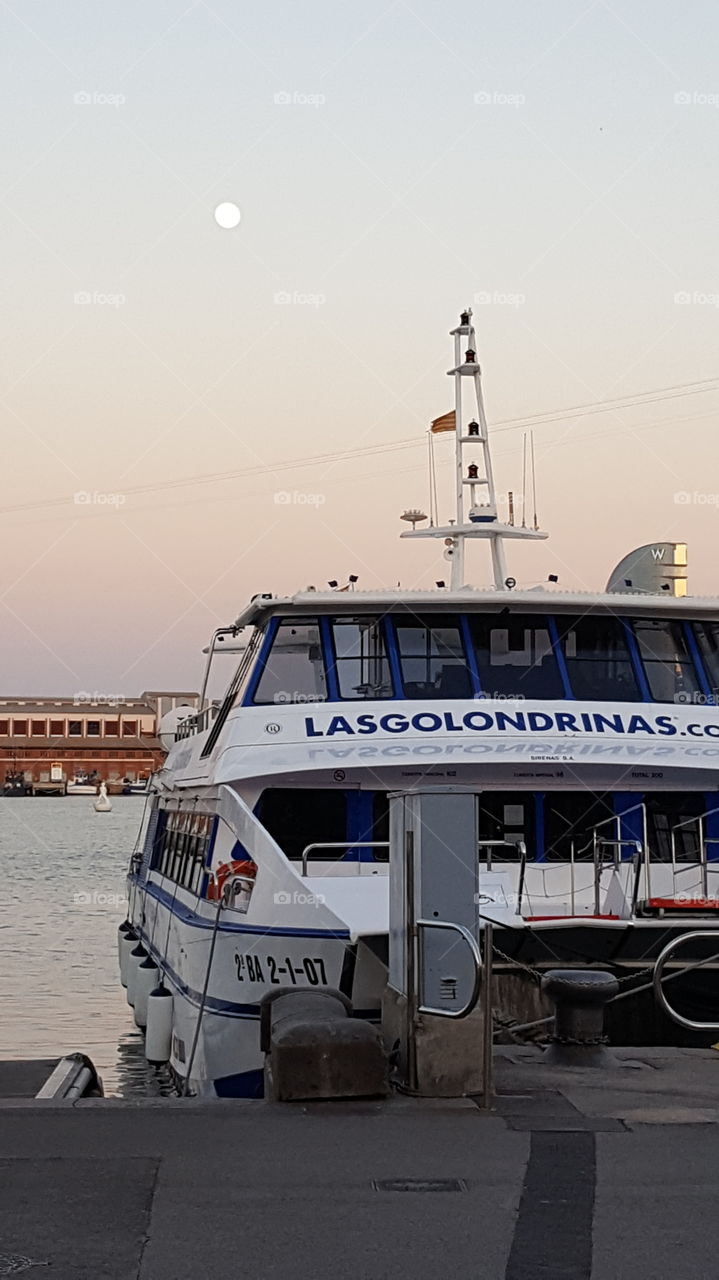 Boat, moon and sunset