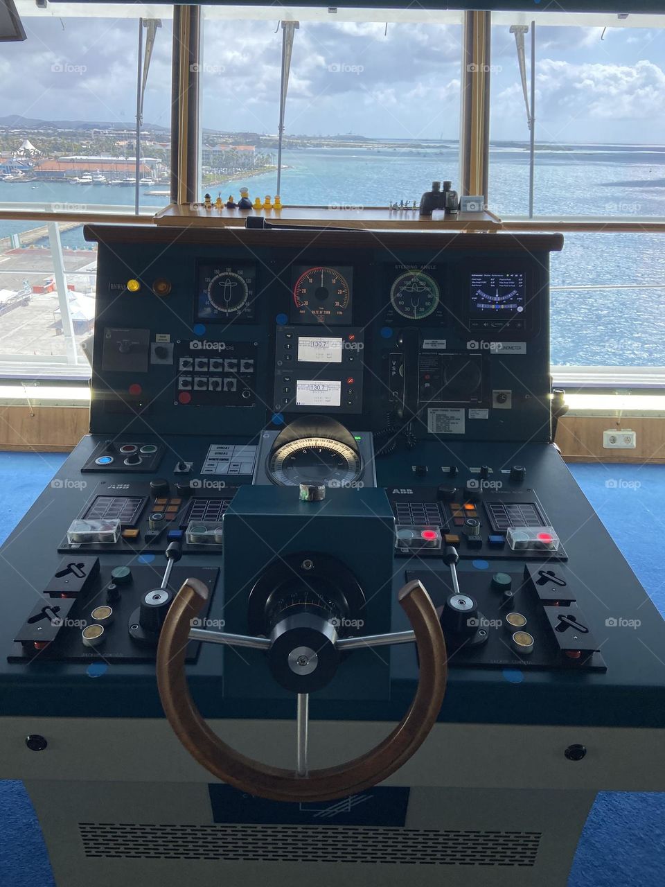 The Captain’s work desk on the bridge with a view of Aruba.