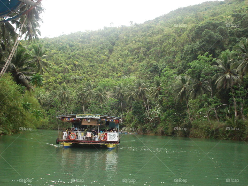 loboc river cruise bohol. one of the loboc raft that serves lunch while on  a river cruise along loboc river