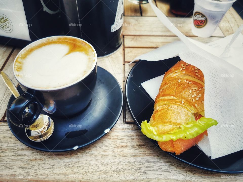 Coffee table served eat tasty view day outdoor outside street capture cafe restaurant