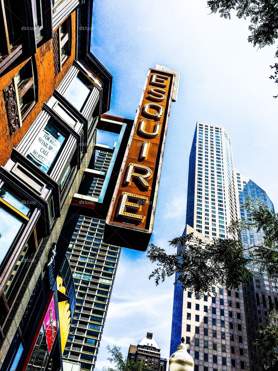 All that is left of the glorious Art Deco Esquire Theater on Oak Street on the northside of Chicago is the pylon, everything else has been turned retail. So sad.