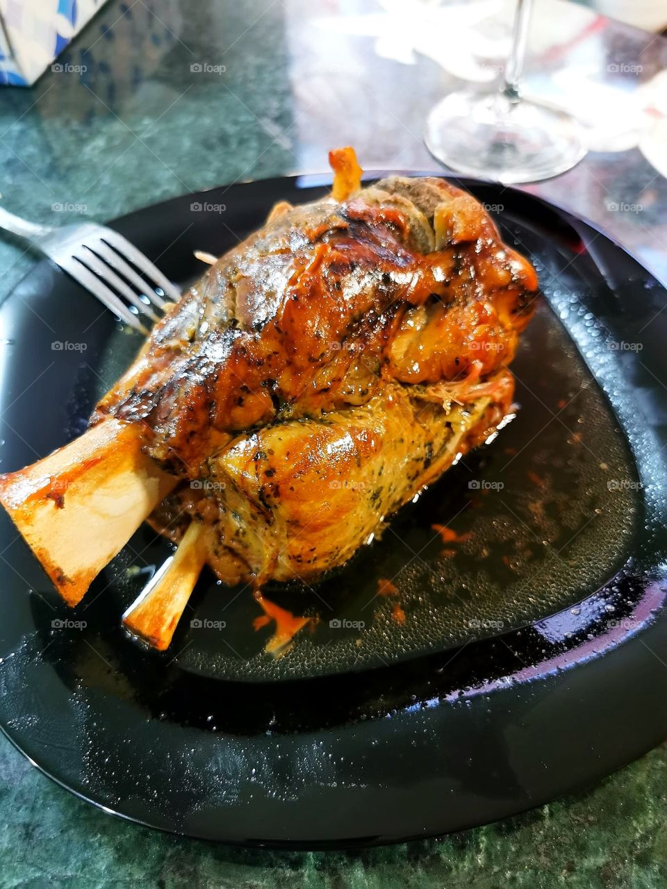 Grilled meat on the bone with spices