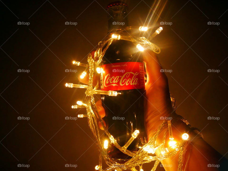 Hold Coke along with fire.