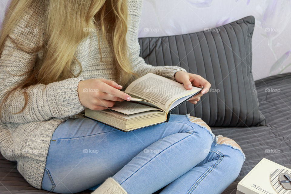 girl is reading a book