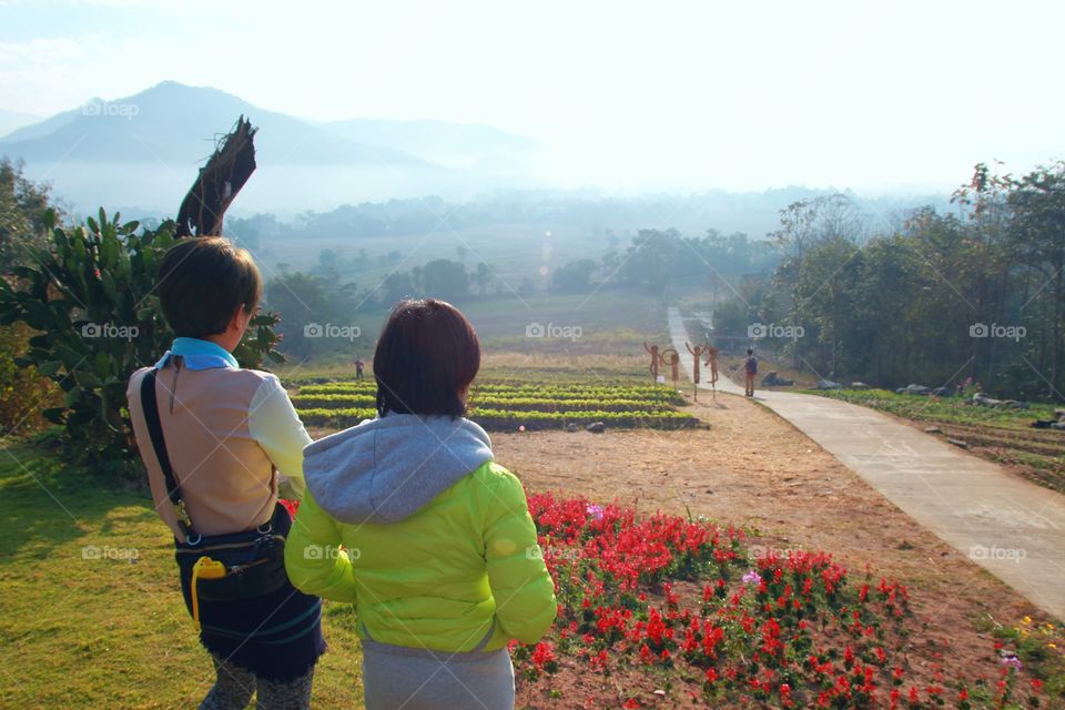 Nature tourists stood two beautiful morning.