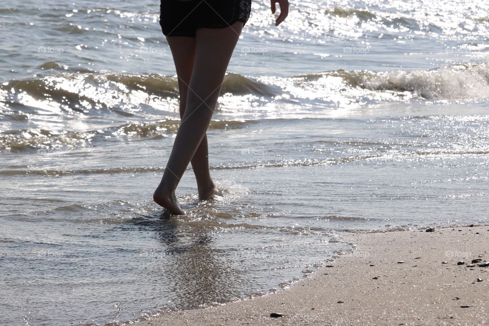 Walking on lake Erie  beach Port Clinton Ohio