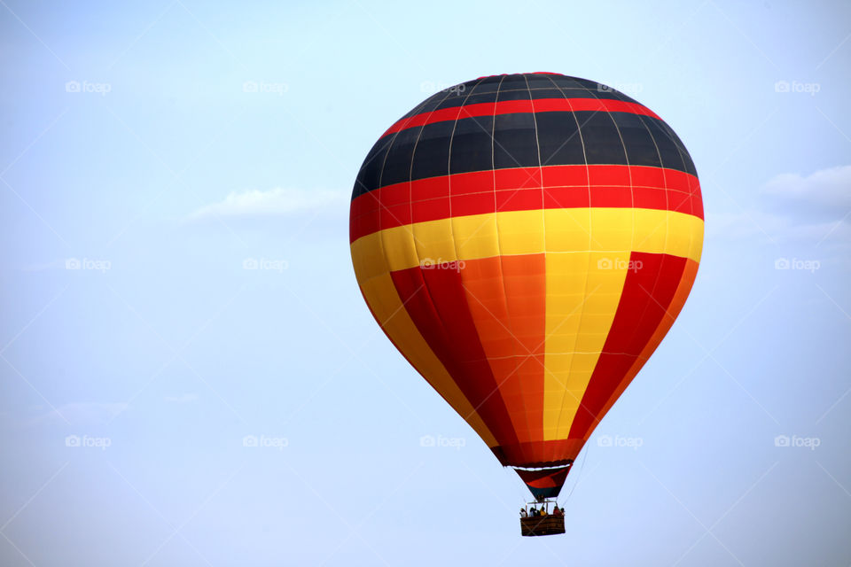 Hot air balloon flying in sky