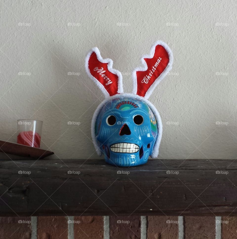 Day of dead skull with Christmas antlers