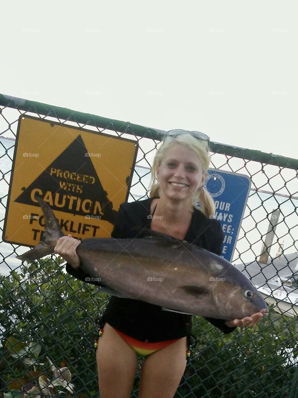 Girl with deep-sea fish