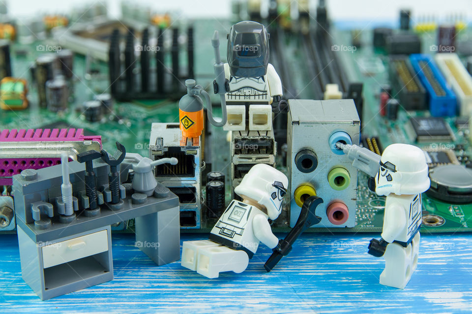 Nonthabure, Thailand - August, 02, 2016: Lego star wars repairing computer motherboard.The lego Star Wars mini figures from movie series.Lego is an interlocking brick system collected around the world.