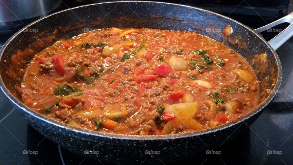 cooking spaghetti for dinner