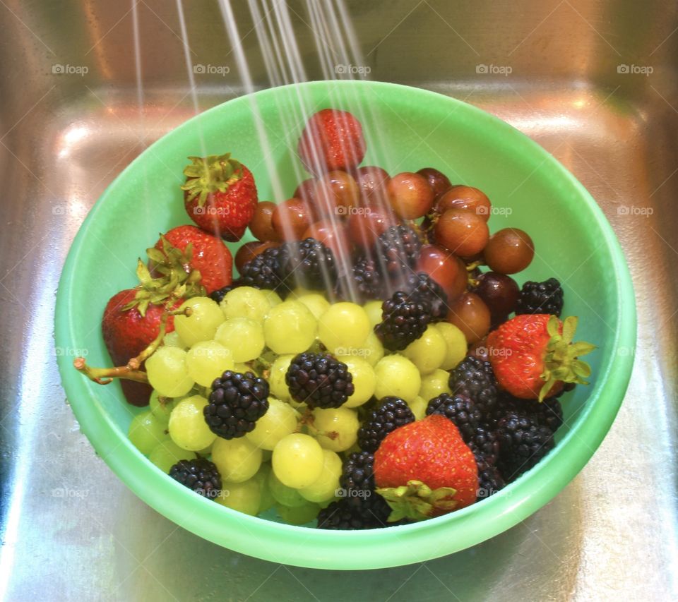 Rinsing Fruits for fruit salad 