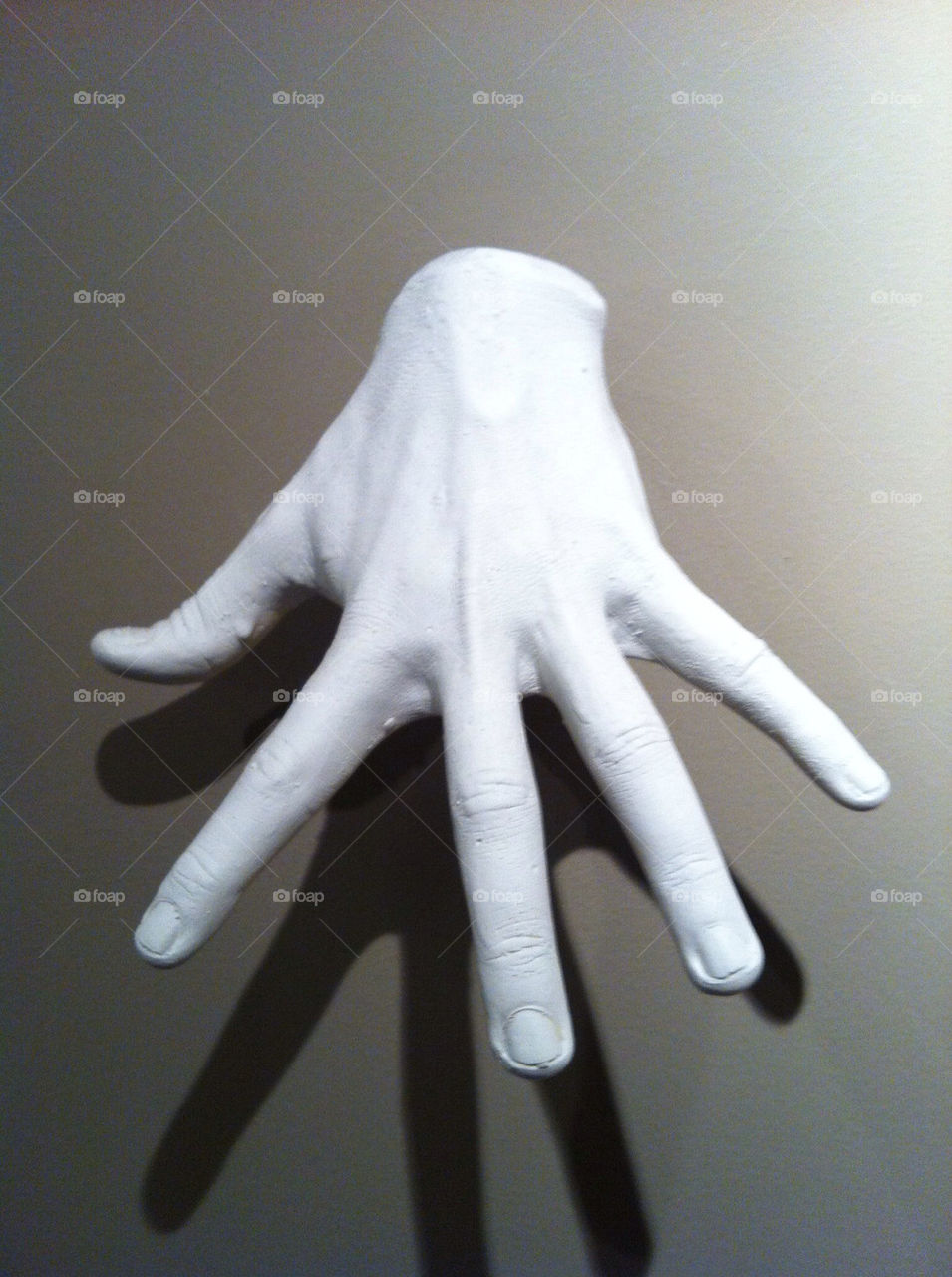 white wall grey hand by meredithk