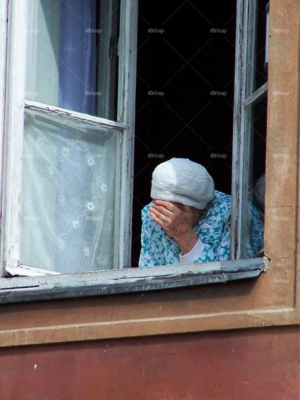 Warsaw, Poland: A Woman at Her Window