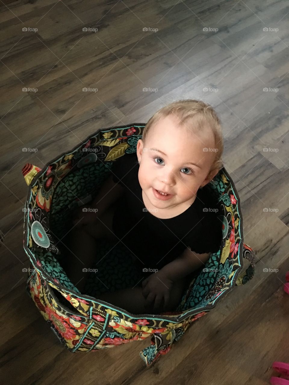 Baby in a bag.